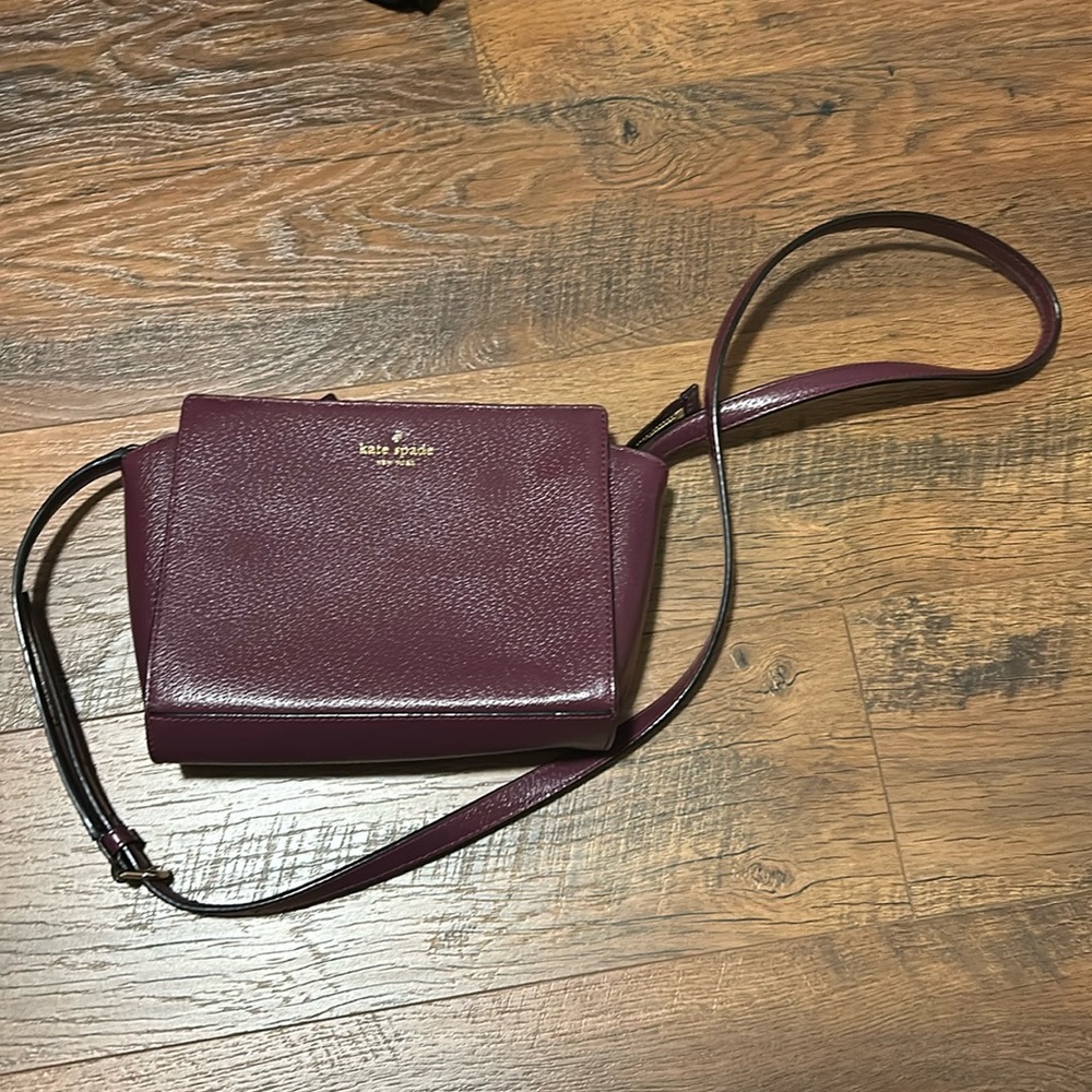 Deep cherry Kate Spade purse.